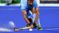 Pemain Tim Hoki India, Rupinder Pal Singh, mengaku pihaknya siap menjegal Indonesia dalam perburuan medali emas Asian Games 2018. (AFP/Anthony Wallace)