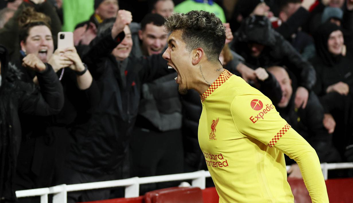 Liverpool berhasil meraup poin dari partai tunda pekan ke-27 Premier League melawan Arsenal yang digelar di Emirates Stadium hari Kamis (17/3/2022). (AP/Ian Walton)