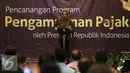 Presiden Jokowi memberikan arahan dalam pencanangan program kebijakan pengampunan pajak atau tax amnesty di Kantor Pusat Dirjen Pajak, Jakarta, Jumat (1/7). Pencanangan Program tersebut dilakukan untuk pembangunan bangsa. (Liputan6.com/Faizal Fanani)
