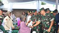 Pelayanan kesehatan gratis bagi masyarakat yang digelar TNI di Kabupaten Deli Serdang, Sumatera Utara. Foto: Dok. TNI