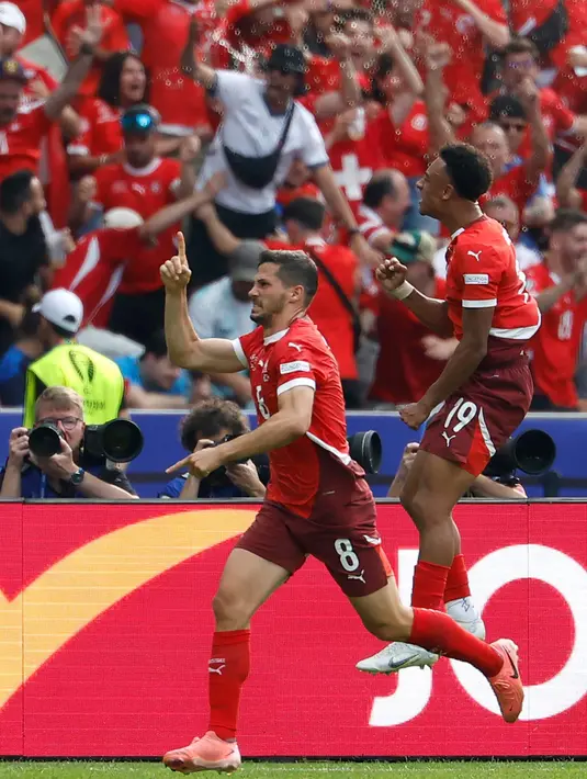 Gol kemenangan Swiss dibuka lewat aksi Remo Freuler pada menit ke-37. (Odd ANDERSEN/AFP)