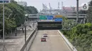 Kendaraan bermotor melintas di jalan Yos Sudarso menuju Pelabuhan Tanjung Priok, Jakarta, Jumat (18/3/2025). (Liputan6.com/Angga Yuniar)