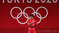 Lifter Indonesia, Deni, saat tampil pada Olimpiade Tokyo 2020 di Tokyo International Forum, Minggu (25/7/2021) malam WIB. (NOC Indonesia)