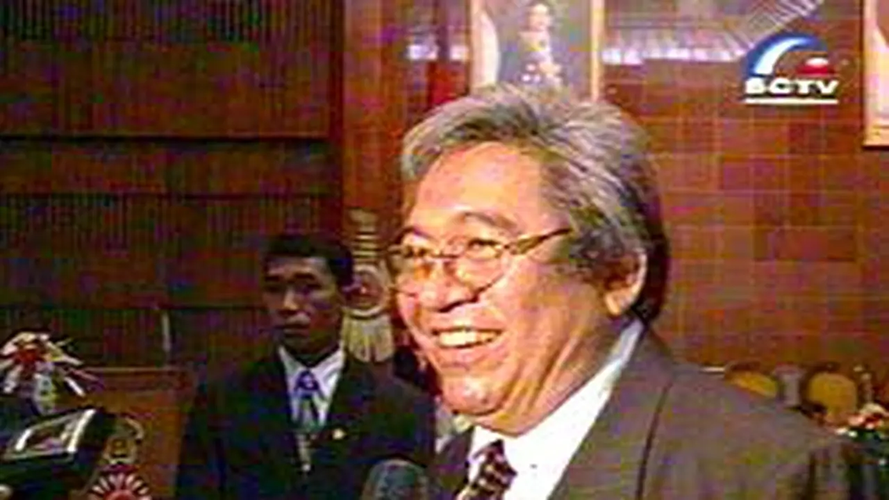 060602aTaufikGus.jpg