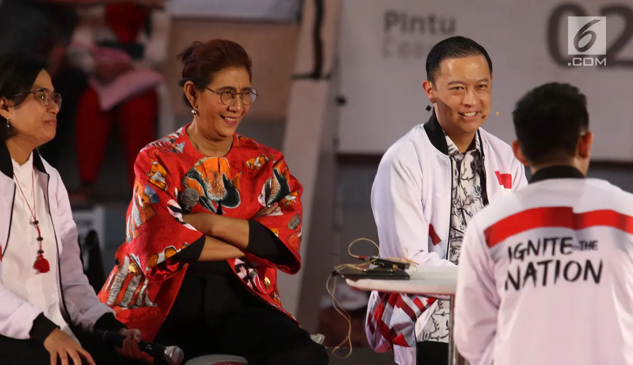 Menkeu Sri Mulyani (kiri), Menteri KKP Susi Pudjiastuti (tengah) dan Kepala Badan Koordinasi Penanaman Modal Thomas Lembong saat memberikan mentoring kepada peserta Gerakan Nasional 1000 Startup Digital di Senayan, Jakarta, Minggu (18/8/2019). (Liputan6.com/Angga Yuniar)