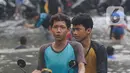 Selain karena hujan, Badan Penanggulangan Bencana Daerah (BPBD) DKI Jakarta menyebut banjir disebabkan oleh luapan kali. (merdeka.com/Arie Basuki)