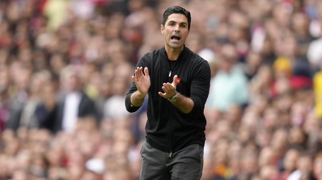 Mikel Arteta. Pelatih Arsenal asal Spanyol yang kini berusia 40 tahun ini menjadi pelatih termuda di Liga Inggris musim 2022/2023. Ia mulai menangani Arsenal pada 22 Desember 2019 menggantikan posisi pelatih caretaker Arsenal saat itu, Freddie Ljungberg. Sebelumnya Mikel Arteta menjadi asisten pelatih Pep Guardiola di Manchester City sejak 3 Juli 2016. Hingga 8 laga pada musim 2022/2023 ini Arsenal dibawanya menduduki puncak klasemen sementara dengan mengoleksi 21 poin dari hasil 7 kali menang dan 1 kali kalah. (AP/Kirsty Wigglesworth)