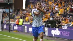 Penyerang Manchester United (MU) Mason Greenwood merayakan gol yang dicetaknya ke gawang Wolverhampton Wanderers pada match day ketiga Liga Inggris di Stadion Molineux, Minggu (29/8/2021). MU menang tipis 1-0 lewat gol Mason Greenwood. (Nick Potts/PA via AP)