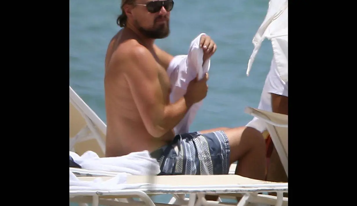 Bintang Wolf of Wall Street itu terlihat sedang menikmati liburan di Pantai Miami (Dailymail.co.uk)