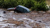 Di Valencia, Badan Meteorologi Spanyol telah mengeluarkan peringatan bahaya. (AP Photo/Gregorio Marrero)