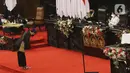 Presiden Joko Widodo saat mengikuti Sidang tahunan MPR RI 2021 di Gedung Nusantra, Senayan, Jakarta, Senin (16/8/2021). Acara dilaksanakan secara minimalis dengan pembatasan peserta dan pengaturan waktu menjadi lebih singkat. (Liputan6.com/Angga Yuniar)