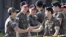 Member BTS yang paling awal masuk barak pada 13 Desember 2022 ini, akhirnya secara resmi kembali dari tugas negara pada hari ini. (Im Byung-shik/Yonhap via AP)