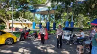 Penjagaan ketat pintu masuk area bandara Djalaluddin Gorontalo (Arfandi Ibrahim/Liputan6.com)