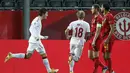 Pemain Denmark, Jonas Wind (kiri) berselebrasi usai mencetak gol ke gawang Belgia pada pada pertandingan UEFA Nations League di stadion King Power di Leuven, Belgia, Rabu (18/11/2020). Dengan kemenangan atas Denmark, Belgia menjadi juara Grup 2. (AP Photo/Francisco Seco)