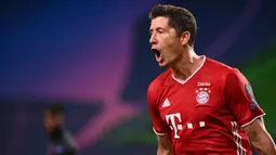 1. Robert Lewandowski - Performa apik Lewandowski menjadikan dirinya sebagai salah satu pemain terbaik di Liga Champions musim ini. Pemain berusia 32 tahun ini menjadi top skor dengan torehan 15 gol dan 9 assist di Liga Champions 2019/2020. (AFP/Franck Fife/pool)