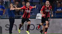 Pemain AC Milan Brahim Diaz (kiri) melakukan selebrasi usai mencetak gol ke gawang Sampdoria pada pertandingan Serie A di Stadion Luigi Ferraris, Genova, Italia, 23 Agustus 2021. AC Milan menang 1-0. (MIGUEL MEDINA/AFP)