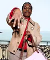 A$AP Rocky, Ambassador Chanel, tampil mengenakan grain suede blouson yang dipadukan dengan heart wool silk shirt serta linen mélange stretch pants, Look 19 dari koleksi Fall-Winter Ready-to-Wear 2026. Dipadukan dengan aksesori, tas, dan sepatu dari Chanel. (Foto: Chanel.dok)