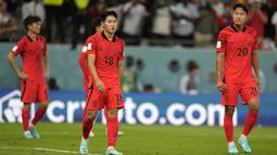 Hasil ini membuat Korea Selatan berada di dasar klasemen Grup H Piala Dunia 2022 dengan raihan satu angka dari dua laga. (AP Photo/Lee Jin-man)