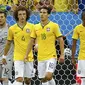 Ekspresi pemain Timnas Brasil, Julio Cesar, David Luiz, Hernanes dan Fernandinho (dari kiri ke kanan), usai dipermalukan Belanda 0-3 di laga perebutan tempat ketiga Piala Dunia 2014 di Stadion Nasional Brasilia, (13/7/2014). (REUTERS/Dominic Ebenbichler) 