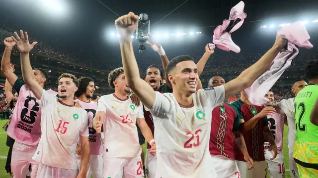Para pemain Maroko merayakan kemenangan atas Belanda