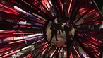 Orang-orang memotret "Out of The Dark" karya Tom Lambert, sebagai bagian dari festival Winter Lights di Canary Wharf, London, Rabu (18/1/2023). Festival Winter Lights kembali ke Canary Wharf untuk pertama kalinya sejak 2020. (AP Photo/Alberto Pezzali)