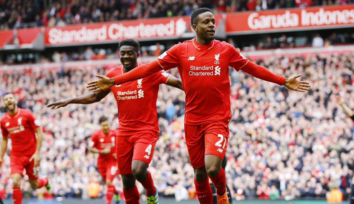 Divock Origi merayakan golnya ke gawang Stoke City, Origi mencetak dua gol untuk Liverpool pada lanjutan liga Inggris di Stadion Anfield, Minggu (10/4/2016). (Reuters/Darren Staples)