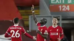 Penyerang Liverpool, Sadio Mane (tengah) berselebrasi usai mencetak gol ke gawang  West Bromwich Albion pada pertandingan lanjutan Liga Inggris di stadion Anfield di Liverpool, Inggris, Senin (28/12/2020). Liverpool bermain imbang atas West Bromwich Albion 1-1. (Clive Brunskill/Pool via AP)