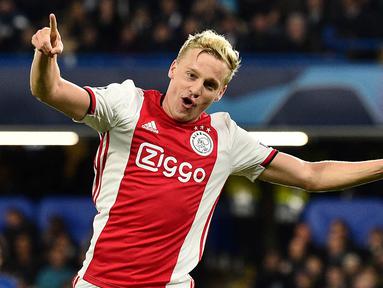 Pemain asal Belanda, Donny van de Beek, akhirnya resmi bergabung dengan Manchester United. Ia diikat dengan kontrak berdurasi lima tahun. (AFP/Glyn Kirk)