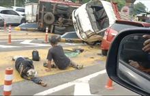 Penampakan Sopir Truk Terkulai Lemas di Jalan GT Halim Usai Tabrak 7 Mobil & Pikap hingga 'Nyangkut' di Pembatas