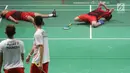 Ganda putra Indonesia, Kevin Sanjaya S/Marcus F Gideon merayakan kemenangan atas Fajar Alfian/M Rian Ardianto di Final Bulutangkis Asian Games 2018 di Istora GBK, Jakarta, Selasa (28/8). Kevin/Marcus unggul 2-1. (Liputan6.com/Helmi Fithriansyah)