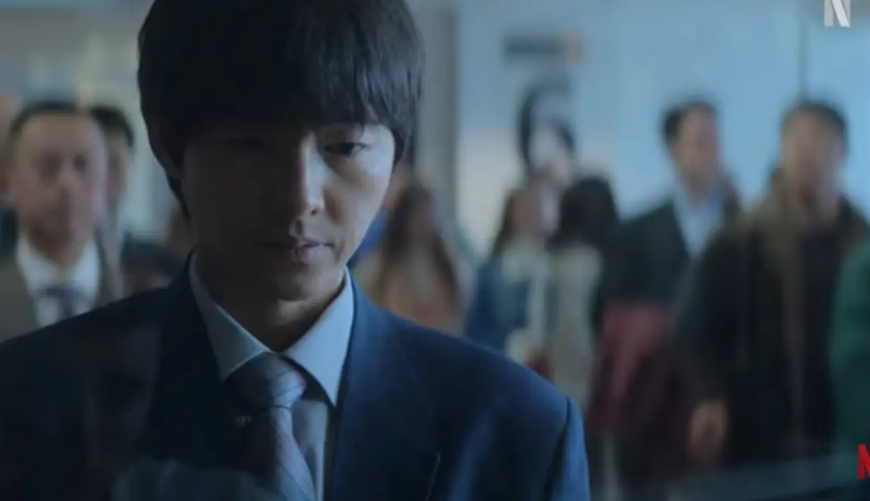 Teaser tersebut mengikuti perjalanan Loh Kiwan yang tiba sendirian di Belgia. Menunggu dengan gugup di depan imigrasi, Loh Kiwan akhirnya memasuki Belgia. (Foto: YouTube/ Netflix Korea)