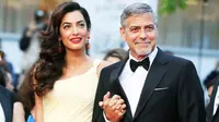 Amal Clooney tampil memikat di karpet merah Cannes Film Festival.