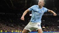 Erling Haaland merayakan golnya saat Manchester City menghadapi tuan rumah Manchester United pada lanjutan Liga Inggris 2023/2024 di Old Trafford, Minggu (29/10/2023).&nbsp;(AP Photo/Dave Thompson)