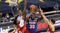 Peningkatan performa di NBA musim ini membuat pemain New York Knicks, Julius Randle dinobatkan sebagai NBA Most Improved Player. (Foto: Getty Images via AFP/Matthew Stockman)