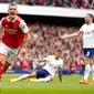 Pemain Arsenal Granit Xhaka melakukan selebrasi usai mencetak gol ke gawang Tottenham Hotspur pada pertandingan sepak bola Liga Premier Inggris di Emirates Stadium, London, Inggris, 1 Oktober 2022. Arsenal menang 3-1. (AP Photo/Kirsty Wigglesworth)