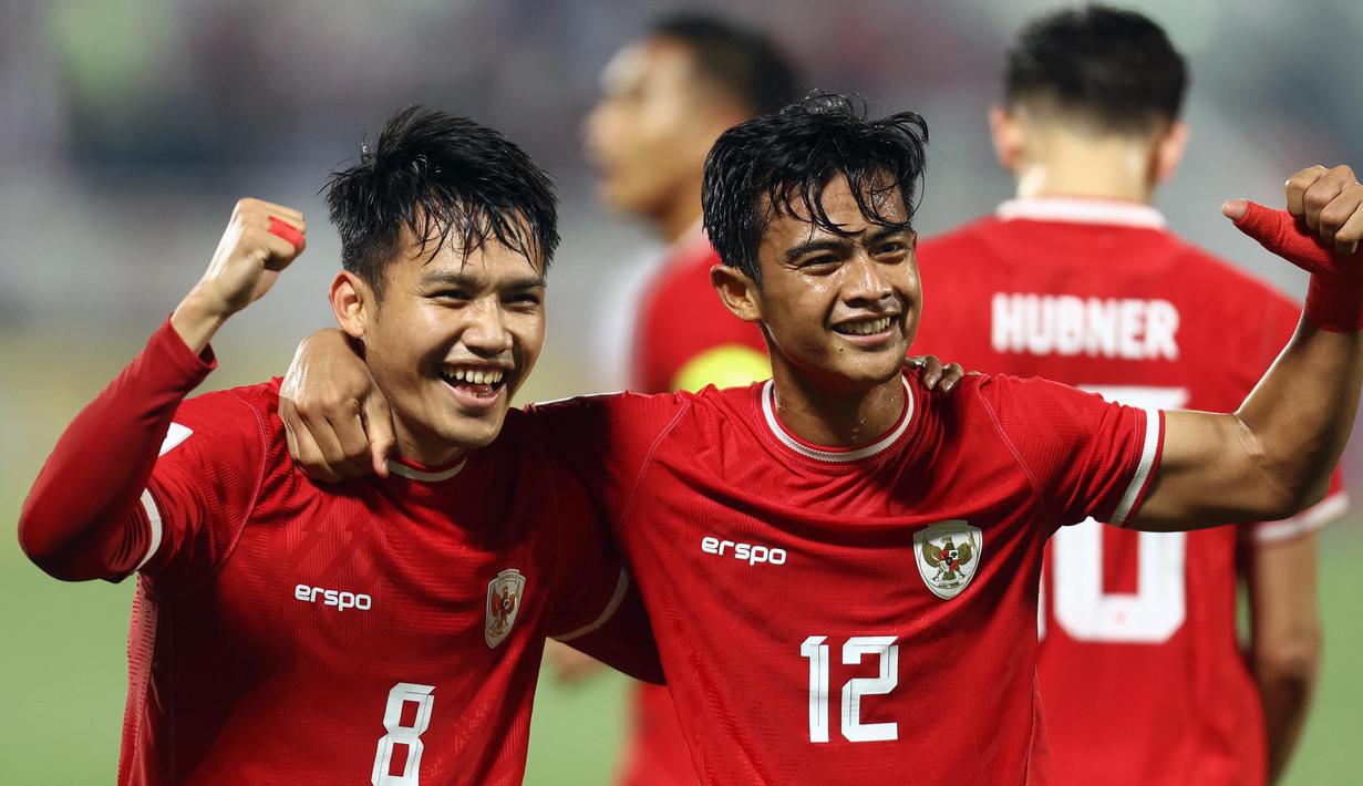 Kemenangan ini menjadi sejarah bagi timnas Indonesia U-23 yang berhasil lolos ke babak perempat final Piala Asia U-23 untuk pertama kalinya. (KARIM JAAFAR/AFP)