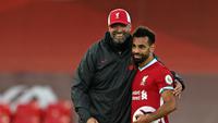 Winger Liverpool, Mohamed Salah, berhasil mencetak tiga gol ke gawang Leeds United pada laga pekan perdana Premier League musim ini di Stadion Anfield, Sabtu (13/9/2020). (AFP/Shaun Botterill/POOL)