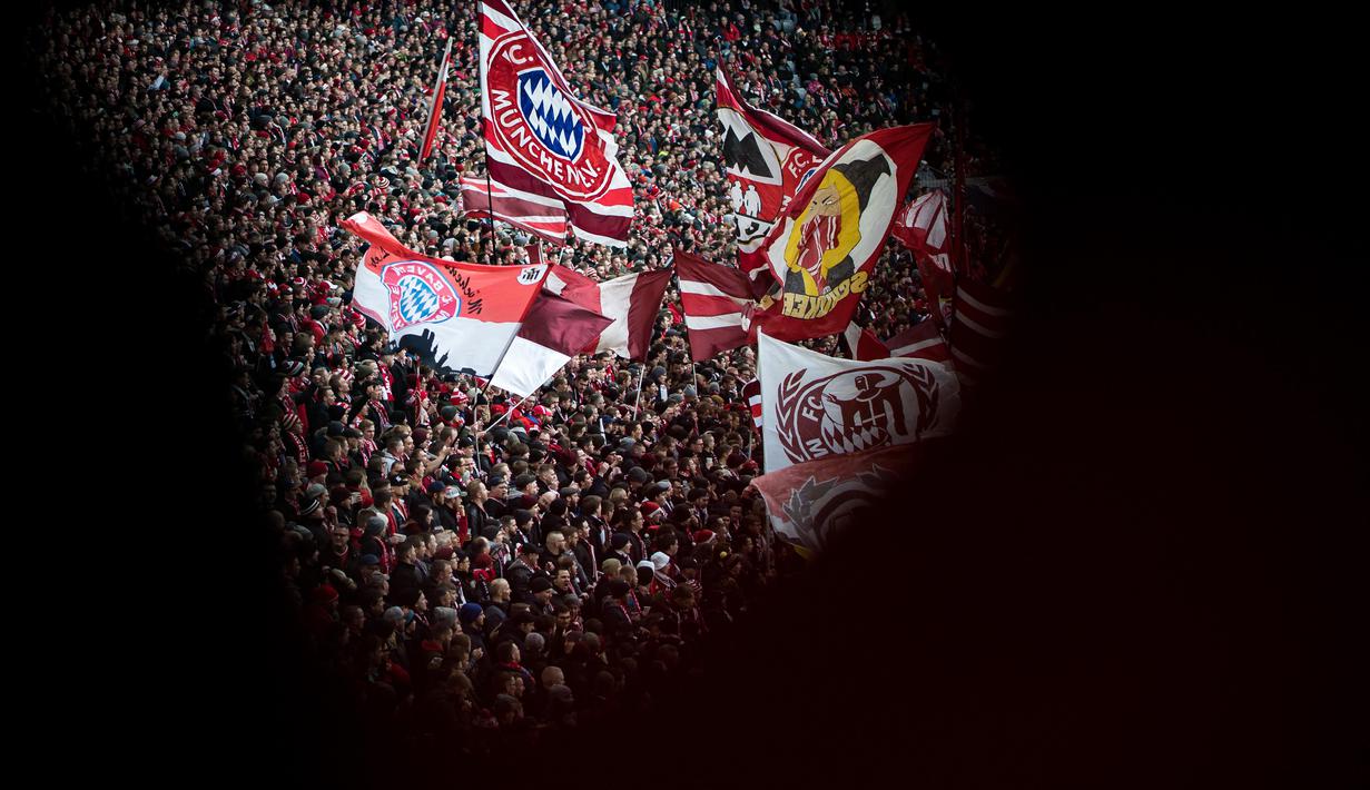Supporters of FC Bayern M¸nchen during the Bundesliga match between FC Bayern M¸nchen and VfL Wolfsburg at Allianz Arena on December 21, 2019 in Munich, Germany. (Photo by Daniel Kopatsch/Bundesliga/Bundesliga Collection via Getty Images)
