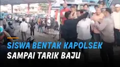 Seorang pelaku menarik baju sang kapolsek hingga kancing lepas.