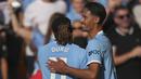 Pemain Manchester City, Tijjani Reijnders merayakan golnya bersama Jeremy Doku dalam laga Liga Inggris 2025/2026 di Molineux stadium, Wolverhampton, Inggris, Sabtu (16/08/2025) waktu setempat. (AP Photo/Dave Shopland)