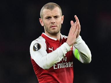 Mantan gelandang andalan Arsenal, Jack Wilshere meninggalkan Emirates pada 2017 ke West Ham United. Tiga tahun kemudain Wilshere dilepas ke Bournemouth. Per tanggal 16 Januari 2022, kontrak pemain Inggris tersebut telah habis dan berstatus bebas transfer. (AFP/Ben Stansall)