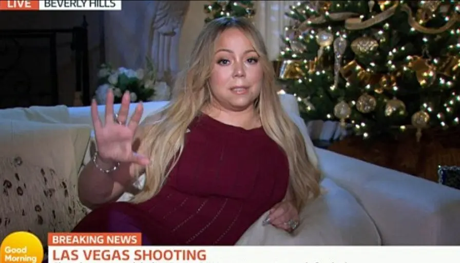 Pose Mariah Carey bak model yang dianggap aneh saat membicarakan korban penembakan Las Vegas.