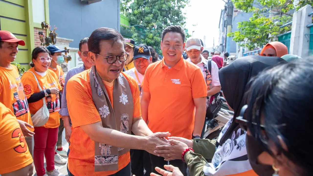 Calon Gubernur DKI Jakarta, Pramono Anung, bersama Bendahara Tim Pemenangan Pram-Doel, Charles Honoris (Istimewa)