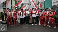 Menkumham Yasonna Laoly saat tiba di LP Klas IIA Narkotika Cipinang, Jakarta, Senin (15/8). Kedatangan Yasonna untuk membuka peringatan  HUT RI ke-71 di Lapas Cipinang. (Liputan6.com/Yoppy Renato)