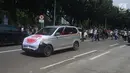 Aliansi Driver Online atau Aliando menggelar demo di Jalan Medan Merdeka Barat, Jakarta, Rabu (28/3). Para driver taksi online ini menuntut Permenhub Nomor 108 Tahun 2017 dicabut. (Merdeka.com/Imam Buhori)