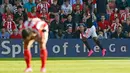 Penyerang MU, Anthony Martial melakukan selebrasi usai mencetak gol ke gawang Southampton pada lanjutan Liga Premier Inggris di Stadion St. Mary, Minggu (20/9/2015). MU menang atas Southampton dengan skor 3-2. (Reuters/Stefan Wermuth)