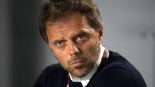 Loris Capirossi saat ini menjabat sebagai Safety Officer Dorna. (OLI SCARFF / AFP)