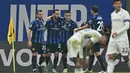 Pada menit ke-43, Inter Milan berhasil mencetak gol penyeimbang lewat aksi Hakan Calhanoglu. (Gabriel BOUYS/AFP)