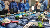 Para jemaah umrah tiba di Bandara Internasional Sultan Mahmud Badaruddin (SMB) II Palembang Sumsel (Liputan6.com / Nefri Inge)