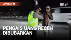 Polisi Bubarkan Warga yang Mengais Uang di Pantura
